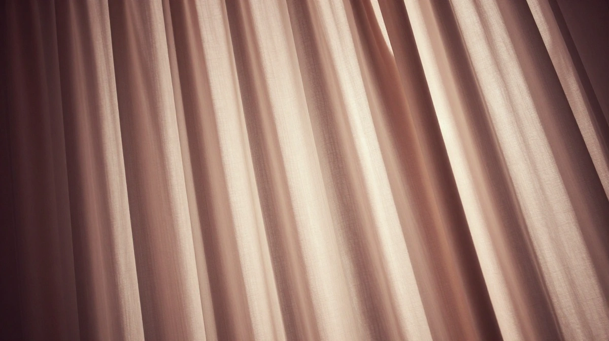 One Curtain Panel Can Split a Studio Into Two Believable Rooms